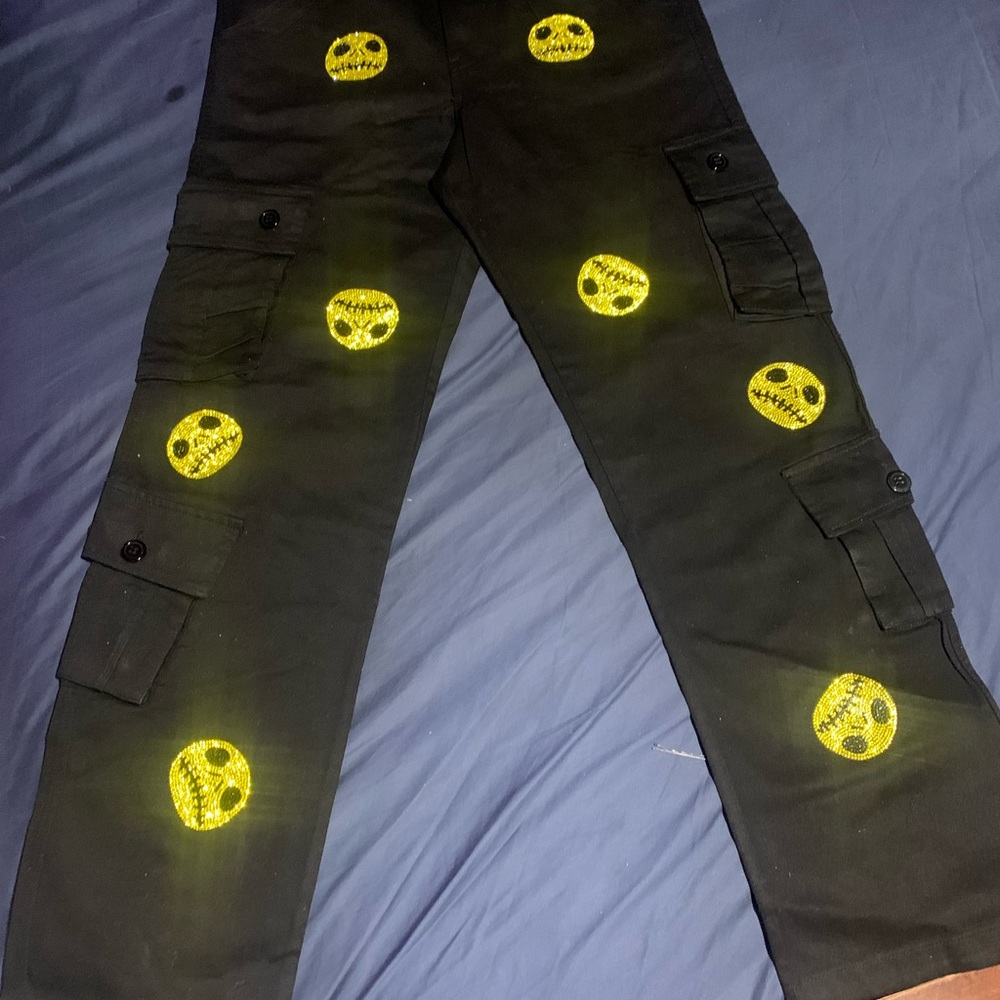 Black and yellow skull cargo pants